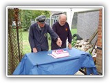 Our Oldest And Our Longest Serving Members Jointly Cut The Cake.